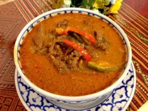 Bowl of red curry with bell pepper served at Thai House Restaurant