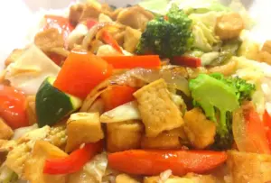 Stir-fried tofu with bell peppers and broccoli at Thai House Restaurant