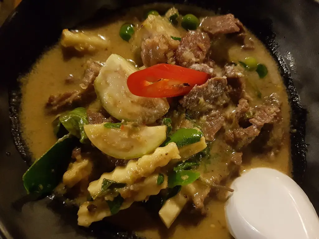 Thai beef green curry with Thai eggplant and red chili