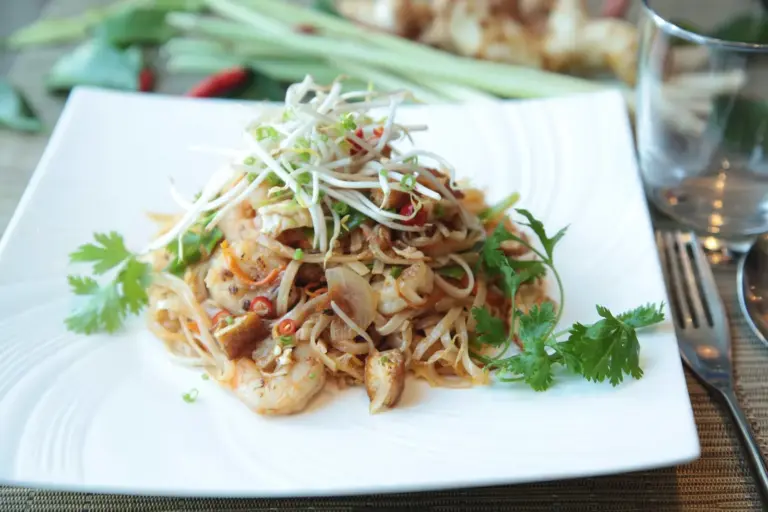 Plated pad thai with fresh herbs from Thai Cuisine in North Pole